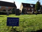 A sign in the churchyard